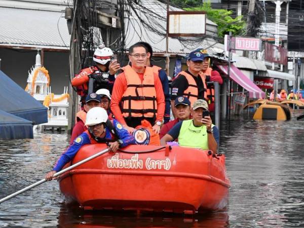 ร่วมกับทีมต้นแบบเครือข่ายเตือนภัยพิบัติชุมชนเพื่อนพึ่ง (ภาฯ) เกาะขันธ์